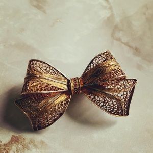 Gold and silver bow brooch